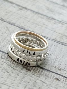 personalized ring-personalized stacking rings-stacking rings-gift for mom-stacked rings-mothers ring Personalized Silver Engraved Ring, Customizable Sterling Silver Stackable Rings For Everyday, Dainty Stacked Rings As A Gift, Customizable Stackable Rings For Mother's Day, Customizable Stackable Rings For Mother’s Day, Silver Stackable Rings For Mother's Day Promise, Silver Hand Stamped Stackable Rings, Anniversary Stacked Sterling Silver Jewelry, Anniversary Sterling Silver Stacked Jewelry