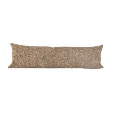 a rectangular pillow with a floral pattern on the front and back, made from linen