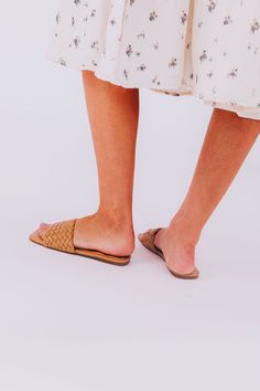 Be a trendsetter in the Lawrence Sandals! These sophisticated shoes come in 2 colors so you can mix and match. Step out in style with the woven upper, squared toe, and comfy padded footbed. Get ready to rock the sandal scene! #summerready Woven upper Man-made material Rubber sole Squared toe Padded footbed Fit is true to size - size up for wider feet Trendy Sandals With Woven Sole For Summer, Trendy Sandals With Woven Sole For Summer Outings, Trendy Brown Sandals With Woven Sole, Trendy Woven Leather Sandals For Spring, Trendy Open Toe Sandals With Textured Sole, Cushioned Footbed Sandals With Square Toe For Summer, Spring Open Toe Flip Flops With Textured Sole, Spring Season Open Toe Flip Flops With Textured Sole, Spring Textured Sole Open Toe Flip Flops