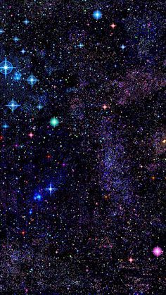 an image of the night sky with many stars and bright blue, purple, and pink colors