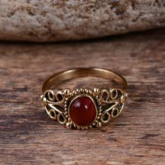 "Red Onyx Ring, Gold Ring, Gemstone Ring, Statement Ring for Women, Handmade Ring, Brass Ring, Designer Ring, Promise Ring, Boho Ring Size:- All Size Available In Variation Metal:- Brass Stone:- Red Onyx 1 product free gift on purchase of 3 products. You can choose the plain brass ring free gift as your wish. Take a screenshot of plain brass ring you like from my shop and send me a photo in personal message. MUST READ....👇 5 stars is my shop's priority. So contact me before leaving any negative Spiritual Ruby Rings In Red, Spiritual Red Ruby Rings, Spiritual Red Promise Ring, Vintage Red Crystal Gemstone Ring, Red Oval Bohemian Rings, Bohemian Carnelian Round Rings, Bohemian Round Carnelian Rings, Bohemian Carnelian Rings, Red Gemstone Toe Ring