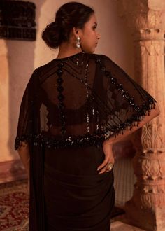 Elegant drape sari in crepe is paired with fully embroidered sequins and beaded georgette cape. The outfit is paired with padded silk blouse and embroidered belt. Saree With Cape, Drape Sari, Party Saree, Party Sarees, Embroidered Belt, Saree Blouse Designs Latest, Elegant Drapes, Trendy Blouses, Ethnic Outfits