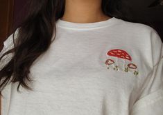 Toadstool Embroidery Cute Embroidered Cotton Shirt, Fall Embroidered Crew Neck Shirt, Cute Embroidered Relaxed Fit Tops, Cute Embroidered Tops With Relaxed Fit, Embroidered Crew Neck Shirt For Fall, White Cotton Tops With Mushroom Print, Casual Long Sleeve Top With Mushroom Design, Casual White Shirt With Mushroom Print, Spring Cotton Tops With Mushroom Print