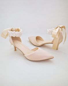 Champagne Satin Pointy Toe Low Heels with Perla Strap, Bridal Shoes Elegant Pearl Ankle Strap Wedding Shoes, Elegant Pearl Wedding Shoes With Ankle Strap, Feminine Wedding Heels With Satin Bow, Elegant Wedding Shoes With Satin Bow For Bridal Shower, Feminine Low Heel Wedding Guest Shoes, Feminine Wedding Shoes For Guests, Feminine Cream Ankle Strap Wedding Shoes, Pearl Wedding Shoes With Pointed Toe, Elegant Cream Kitten Heels For Wedding