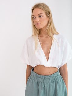 "ISLA is a high waist linen shorts. DETAILS - High waist - Elasticated waist - Side seam pockets - Oeko-Tex certified 100% lightweight linen - Cut and sewn to order just for you in our studio COLOR - Dark turquoise, you can also choose other colors above - Fabric samples are available here https://www.etsy.com/listing/586569696/linen-fabric-samples SIZING & FIT - Fits true to size - Inseam measures 4.92\" / 12.5 cm - Measurements taken from a size S - Model is wearing a size S - Model is 5'8 Beach Tops With Built-in Shorts And Short Sleeves, Versatile Relaxed Fit Summer Shorts, Versatile High-waisted Shorts For Summer, Summer Crop Top With Short Sleeves, Relaxed Fit Short Sleeve Summer Crop Top, Summer Tops With Elastic Waistband, Relaxed Fit Summer Crop Top With Short Sleeves, Summer Crop Top With Relaxed Fit And Short Sleeves, Summer Tops With Elastic Waistband And Relaxed Fit