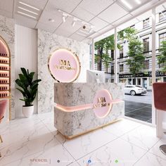 the interior of a nail salon with marble counter tops and pink chairs in front of large windows