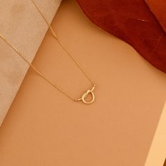 Jenna Elevate your everyday style with the enduring sentiment of the Minimalist Design Promise Knot Pendant Necklace. This necklace features a dainty, intricate knot pendant crafted from solid 14k gold (available in yellow, white, or rose gold). The classic knot design is a timeless symbol of love, commitment, or everlasting connection. Made from 14k solid gold, this necklace offers enduring beauty and a touch of luxury. - Handmade- Solid Gold- Size of the Knot: 7 x 15 mm All pieces come beautif Minimal Pendant, Promise Necklace, Minimal Gold, Minimalist Pendant, Simple Chain, Timeless Symbol, Solid Gold Necklace, Handmade Fine Jewelry, Knot Design