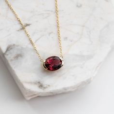 Red Tourmaline Necklace 14K Gold - Rubellite Oval Solid Gold Pendant - Anniversary Gift for Her - Kyklos Jewelry GN00036 ● Metal: 14K solid gold ● Gemstone: Red Tourmaline ● Gemstone's weight: 3.20 ct ● Length: 40 cm G I F T S All our pieces are delivered beautifully packaged and gift ready. The gift wrap consists of a jewelry box and a paper bag with our logo. P R O D U C T I O N ∙ T I M E * S H I P P I N G * P O L I C I E S Please keep in mind that each item is handcrafted, and we need 5 days Classic Oval Ruby Necklace, Elegant Oval Tourmaline Necklace, Yellow Gold Garnet Necklaces With Oval Shape, Yellow Gold Oval Garnet Necklace, Elegant Oval Garnet Necklace, Oval Tourmaline Jewelry For Formal Occasions, Classic Oval Tourmaline Jewelry, Elegant Oval Tourmaline Pendant, Formal Oval Garnet Pendant Jewelry