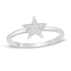 She'll love the simply stellar style of this dreamy diamond accent ring. Crafted in sterling silver, this spirited choice showcases a sculpted star shimmering with diamond accents. Polished to a bright shine, this design is an irresistible eye-catcher. This ring is available in select sizes only. Sterling silver rings cannot be resized after purchase. Sterling Silver Star-shaped Diamond Ring, Celestial Silver Diamond Ring For Anniversary, Star Shaped Rings With Polished Finish, Star-shaped Single Diamond Jewelry For Anniversary, Star-shaped Ring With Polished Finish, Star-shaped Ring With Polished Finish In Fine Jewelry, Sterling Silver Star-shaped Diamond Promise Ring, Silver Star-shaped Diamond Ring Gift, Sterling Silver Star-shaped Diamond Ring For Anniversary