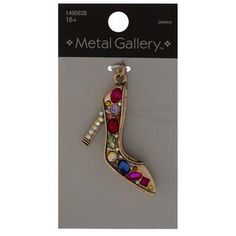 Dimensions: 1.97" x 1.15" Material: Metal & Acrylic Color: Pink, Blue, Purple & Green Metal Color: Gold Age Grade: 16+ Quantity: 1 Give your jewelry creations a fabulous flair with this Bejeweled High Heel Shoe Pendant! This ravishing pendant boasts a metallic high heel shoe embellished with a variety of faceted rhinestones, perfect for adding a glamorous look to your pieces. Use it with complementary charms and beads to create a stylish statement necklace to your looks! Glamorous Multicolor Jewelry As Gift, Glamorous Multicolor Jeweled Jewelry, Multicolor Rhinestone Jewelry, Multicolor Metal Bling Jewelry, Metallic High Heels, Jewelry Charms Pendants, Green Metal, Rhinestone Jewelry, Jewelry Creation