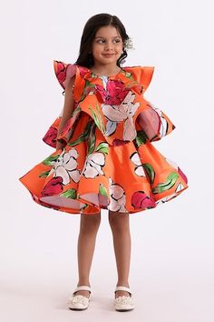 Orange tiered, layered dress with all-over floral prints. - Aza Fashions Tiered Printed Dress For Garden Party, Playful Tiered Ruffle Dress, Orange Ruffled Dress For Garden Party, Playful Multicolor Tiered Dress, Spring Tiered Ruffle Dress For Dress-up, Spring Tiered Ruffle Dress For Dress-up Events, Orange Tiered Skirt Dress For Spring, Multicolor Floral Print Dresses For Dress-up, Multicolor Floral Print Dress-up Dresses