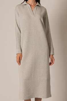 Experience the ultimate combination of comfort and style with this luxuriously soft midi dress. Perfect for any occasion, this versatile piece is a must-have in your wardrobe. Its effortless chicness and easy wearability will make you never want to take it off! Shop the coordinating pieces now. Elegant Loungewear Dress In Solid Color, Oversized Chic Maxi Dress For Loungewear, Versatile Midi-length Dress For Work, Chic Longline Maxi Dress For Loungewear, Elegant Spring Maxi Dress For Loungewear, Oversized Knee-length Dress For Daywear, Oversized Knee-length Day Dress, Modern Fall Dress For Daywear, Modern Dresses For Fall Daywear