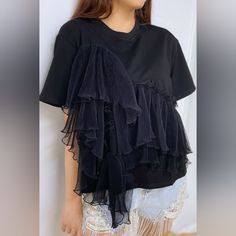 Dress Up Your Casual Look With This Ruffle Lace Detailed T-Shirt! Short Sleeve Tee, Lace Ruffle Detail Slightly Cropped And Side Slits At Bottom Hem Asymmetrical Ruffle Layers, Plenty Of Stretch Available In Black With Black Lace Or White With Pink Lace Cheap Long Sleeve T-shirt With Ruffles, Cheap Fitted Shirt With Ruffles, Cheap Black Tops With Ruffle Sleeves, Cheap Women's Ruffled T-shirt, Ruffled Sleeve Tshirt, Cheap Fitted Ruffle T-shirt, Cheap Fitted T-shirt With Ruffles, Affordable Cotton T-shirt With Ruffle Sleeves, T Shirt Add Ruffle To Sleeve