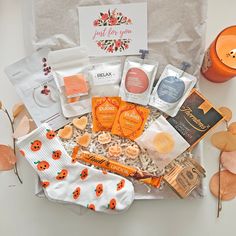 Indulge in self-care this Halloween with our Halloween self-care hamper. Treat yourself or a loved one, Limited availability, get yours now! INCLUDED IN EACH BOX: - Pumpkins socks - Face mask sheet - Eco Spa treatment Body lotion - Eco Spa Treatment Hair Conditioner  - 100 gr Luxury bath salts pouch - Handmade Pumpkin Spice mini bath bomb hearts - Handpoured Halloween wax melts - Spiced Pumpkin - Spiced orange scented candle in glass jar - Luxury Hot chocolate sachet  - Lindt Orange milk chocolate bar - 2 organic Three Ginger teabags - 1 Fully personalisable handwritten card: choose between 24 card designs or a plain white card  Don't hesitate to contact us if you want any specific items to be replaced, we have plenty of alternatives. *We have handmade shower steamers in stock for people w Halloween Self Care, Coconut Face Mask, Orange Scented Candle, Halloween Gift Baskets, Hamper Gift, Spa Gift Box, Mask Sheet, Eye Patches, Orange Spice