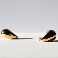 With these Bottega drop gold earrings, all that glitters is gold. Inspired by the iconic Italian fashion house Bottega Veneta, hand-finished, these statement earrings will add a touch of sophistication and glam to any outfit. The Bottega drop gold earrings feature a timeless design with delectably smooth edges and finishes. These are complemented with exquisite craftsmanship for a luxurious look that's guaranteed to turn heads. These earrings are fit for any occasion, effortlessly taking you fro Valentina Rose, Drop Gold Earrings, All That Glitters Is Gold, Smooth Edges, All That Glitters, Drops Design, Gold Drop Earrings, Fashion House, Elevate Your Look