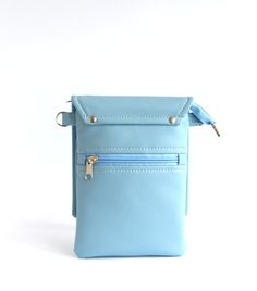 "Sky Blue Cell Phone Bag Small Crossbody Iphone Purse Cell Phone Purse Cell Phone Crossbody Bag Iphone Bag Cell Phone Case Small Travel Bag Create your own unique color combination with monogram, name or initials embroidery: https://www.etsy.com/ludamelnick/listing/713580849/crossbody-messenger-purse-leather Handmade cell phone bag. Made of vegan leather, fabric inside. This small bag can be used for phone, documents and other necessary trifles. Fits devices up to 6.5\" (16,5 cm) x 4.5\"(11,4 cm Initials Embroidery, Iphone Purse, Iphone Bag, Vegan Bag, Small Travel Bag, Messenger Purse, Cell Phone Bag, Cell Phone Purse, Small Crossbody Purse