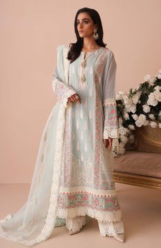 Embroidered Pakistani Net Salwar Kameez Dupatta Dress is an elegant masterpiece to wear on special occasions. This stunning Pakistani Party Dress has a beautiful contrast of pink shade, creating an exquisite masterpiece, that will give you your desired dreamy look. Kameez: The beautiful kameez in an alluring blue color comes in premium net fabric. The stunning kameez is fully emblazoned with graceful embroidery. Floral designs, patches, elegant contrast of pink shade, and lacework give a perfect Pakistani Kameez, Pakistani Women Dresses, Kameez Designs, Fancy Suit, Simple Kurta Designs, Simple Kurti Designs, Pakistani Fancy Dresses, Casual Wear Dress, Elegant Attire