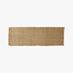 a piece of jute on a white background with a light brown area rug in the middle