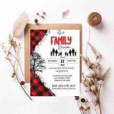 a family reunion party is set up on a table next to some dried flowers and leaves