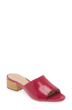 A glossy leather upper adds luxe appeal to a slide sandal lifted by a raffia-wrapped block heel. 1 3/4" heel Leather upper, lining and sole Imported Pink Sandals With Contrasting Heel Counter For Summer, Beach Mules With Block Heel And Leather Sole, Summer Wedge Heel Mules With Leather Sole, Summer Mules With Leather Sole And Wedge Heel, Summer Block Heel Mules With Leather Sole, Summer Mules With Leather Sole And Block Heel, Summer Leather Sole Mules With Wedge Heel, Summer Pink Heels With Leather Sole, Pink Summer Heels With Leather Sole