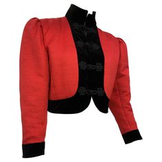 1980s Ungaro Red Silk Faille Bolero Jacket w Black Velvet Trim & High Collar: Front frog closures and pleated puff shoulders. Tapered sleeves with banded cuffs. Size US 4-6. Bolero Jacket, Velvet Trim, Class Projects, Red Silk, High Collar, Black Velvet, Velvet, Trim, Fashion Outfits