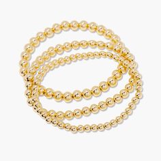 Make a statement with the Makenna Bracelet Set! Featuring gold bead bracelets for a look that's both glamorous and unique, this set will add an effortless sparkle to your wardrobe. Embrace your individual style and dazzle with this timeless set. Available in 14k gold plated and rhodium plated brass Size: 6" stretch bead bracelet 4mm bead bracelet 5mm bead bracelet 6mm bead bracelet Protected with an anti-tarnish barrier SKU: STB1018 Trendy Gold Stackable Stretch Bracelet, Gold Trendy Stretch Bracelet With Spacer Beads, Gold Charm Bracelet With Round Beads For Party, Trendy Gold Stretch Bracelet With Spacer Beads, Trendy Gold Beaded Bracelets For Party, Trendy Gold Bracelets With Round Beads, Gold Beaded Bracelets For Party With Round Beads, Gold Stackable Beaded Bracelets For Party, Trendy Gold Stretch Bracelet With Beads