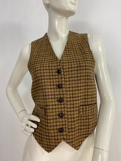 "Pat mcdonagh vest, vintage pat mcdonagh vest, vintage plaid wool vest, women's size small * please see last pictures the back is a little discoloured because of the age of the garment, no rips or tears  Measurements:  Shoulder (outer seam-seam)12\"/bust/chest(armpit-armpit)17\"/waist 16\"/length 18\"-22\"(front)/back length 17\" Mannequin measurements:  5'8\", bust 34\", waist 25\", hip 33\" Please note that vintage clothing sizes can vary greatly.  The Measurements provided  are approximate and are taken lying flat.  I suggest taking a similar garment from your wardrobe and measure it while lying flat.  This way you can compare measurements.  All of our pieces are genuine vintage. Don't forget to enlarge the photos and take a closer look at this genuine vintage item!! I will ship your it Thrifting Inspiration, Clothing Board, Wool Vest, Vintage Plaid, Vest Outfits, Wool Plaid, Womens Vest, The Age, Vintage Clothing