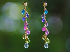 "THE JEWELRY IS SHIPPED via DHL EXPRESS (2-5 days delivery door to door). THE DHL SHIPPING COST IS INCLUDED IN THE PRICE. The Rainbow Lagoon Earrings - Multi Gemstone Colorful Rainbow Earrings Wire Wrapped in Gold Filled ► Measurements / Details: - Length of the earrings including earwires: 2.44\" (~6.2 cm) - Gold: High quality 14K Gold Filled - Silver: High quality Sterling Silver (the posts in silver are round balls) ► Gemstones: The Earrings include excellent AAA quality gemstones, they are n Multicolor Gemstone Accent Fusion Earrings, Multicolor Gemstone-accented Fine Jewelry Earrings, Multicolor Gemstone Accented Fine Jewelry Earrings, Fine Jewelry Multi-stone Drop Earrings, Multicolor Teardrop Earrings With Gemstone Accents, Multicolor Dangle Earrings With Gemstone Accents, Multicolor Gemstone Drop Earrings, Multicolor Gemstone Long Drop Earrings, Multicolor Multi-stone Teardrop Earrings