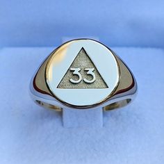 We are pleased to introduce our new ring for all Grand Inspectors Generals of the 33°, Chevalier style for the small finger. One of the most iconic symbols of Freemasonry that few people have been able to decipher, even holders of the degree. Available in large quantities other metals and other stones upon request. Box dimensions of 45 Χ 50 Χ 40 mm having a total weight of 45 grams. Delivery and Postage: Postage of non-gold items is serviced with standard delivery options. Standard delivery is b Symbolic White Gold Engraved Open Ring, Symbolic White Gold Rings For Anniversary, 14k Gold Symbolic Rings With Engraving Option, Adjustable Symbolic Signet Ring For Anniversary, Symbolic White Gold Rings For Formal Occasions, Formal Symbolic White Gold Rings, Symbolic Formal Signet Ring With Polished Finish, Timeless Silver Engraved Ring Stamped 14k, Symbolic Engraved White Gold Ring For Anniversary