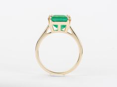 ♥ A solid 14K yellow gold ring set with a stunning emerald in the center with double claw prongs♥ Gorgeous green color!♥ The item measures 12.1mm in length, 9.9mm in width, and stands 7.8mm from the finger
♥ US Size 7 (Free resizing up or down 1 size)♥ Band width: 2.8mm♥ Gemstone: Emerald, 5.33ct♥ All stone(s) used are genuine, earth-mined, and guaranteed conflict free! As is with anything that is naturally occurring, our gemstones or pearls will have imperfections, e.g. inclusions in the gemsto Luxury Solitaire Emerald Ring For Formal Occasions, Modern Emerald Ring With Baguette Cut And Prong Setting, Modern Emerald Ring With Baguette Cut, Modern Baguette Cut Emerald Ring With Prong Setting, Modern Baguette Cut Emerald Ring In Prong Setting, Elegant Polished Emerald Cut Emerald Ring, Elegant Emerald Cut Emerald Ring With Polished Finish, Luxury Prong-set Cushion Cut Emerald Ring, Luxury Cushion Cut Emerald Ring With Prong Setting