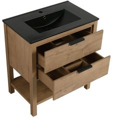 a bathroom vanity with two drawers and a black counter top on the bottom, in front of a white background