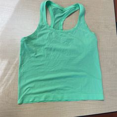 Lululemon Swiftly Tech Racerback Tank Top 2.0 *Race Length In Scream Green Light, Size 8 Really Pretty And Unique Color. Too Big On Me Unfortunately. Race Length Is Very Flattering Nwot, Perfect Condition Send Me Offers! Green Racerback Gym Top, Green Scoop Neck Top For Gym, Green Scoop Neck Sports Top, Green Training Tank Top With Light Support, Green Seamless Scoop Neck Activewear, Green Racerback Sports Bra For Light Exercise, Green Racerback Activewear For Light Exercise, Green Breathable Racerback Tank Top, Green Sports Tank Top With Light Support