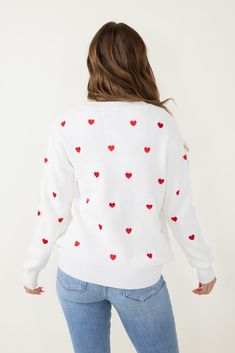 Stay cozy and stylish in this Miracle Heart Sweater for Women in White. The long sleeves and red heart pattern provide a stylish look, perfect for any occasion. Feel confident and cozy with the perfect sweater! Features: Miracle Style: W8009-IVORYRED Color: Ivory Red 53% Viscose 26% Nylon 21% Polyester Women’s sweaters Super soft material Midweight construction Long sleeves Red heart pattern Measurements from a size small: Length from center back: 21” Chest: 50” Red Heart Pattern, Women In White, Red Heart Patterns, Perfect Sweater, Heart Sweater, Sweater For Women, Heart Pattern, Stay Cozy, Color Ivory