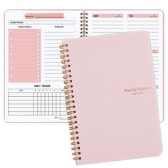 a pink planner with the words weekly planner written on it and an open spiral notebook