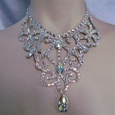 This necklace was created with Crystallized™ Swarovski Elements aurora borealisclear crystals. The necklace is approximately 4 ½ inches at the widest point in front and tapers in the back for comfort. Ballroom Competition, Popular Necklaces