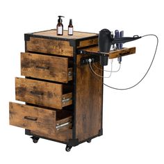 a wooden cart with drawers and two bottles on the top, attached to an electric hair dryer