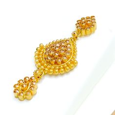 This Graceful Drop 22k Gold Kundan Necklace Set, weighing 51.8 grams, is a stunning fusion of traditional craftsmanship and elegance. Adorned with exquisite Kundan stones, it features a luxurious yellow gold finish. The set has a necklace length of 16 inches, with a drop length of 1.75 inches, and 1.7-inch adjustable links for a customizable fit. A secure hook lock ensures comfortable wear. Matching earrings, each 1.75 inches in length with screw-back posts, complete the set. Ideal for those who Traditional 22k Gold Earrings With 17 Jewels, Hand Set Yellow Gold Round Kundan Necklace, Traditional Gold-plated Kundan Pendant Necklace, Yellow Gold Round Kundan Necklace In Temple Style, Yellow Gold Round Kundan Necklace Temple Jewelry, Traditional Gold Plated Kundan Pendant Necklace, Yellow Gold Round Kundan Temple Necklace, Gold Plated Kundan Necklace For Temple Jewelry Gift, Temple Jewelry Style Gold Plated Kundan Necklace As Gift