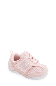 Baby's first steps will be supported in this sporty sneaker featuring a roomy toe box and easy-on/off strap. Adjustable hook-and-loop strap Removable insole Textile and leather upper/synthetic lining/rubber sole Imported Sporty Breathable Sneakers For Playtime, Sporty Breathable Sneakers For Casual Wear, Pink Non-slip Low-top Walking Shoes, Low-top Running Sneakers With Soft Sole, Sports Sneakers With Soft Synthetic Sole, Synthetic Sneakers With Soft Sole, Synthetic Sneakers With Soft Sole, Closed Toe, Sporty Slip-resistant Sneakers For Playtime, Soft Sole Synthetic Sneakers