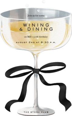 a wine glass with a black ribbon around it