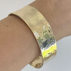 14KT polished yellow gold hammered + textured cuff bangle bracelet. An amazing. Italian-made, modern statement cuff to stack with more bangles. Open cuff; simply slide over wrist Fits most wrist sizes; adjustable size Width: 19mm 585/ 14kt purity Weight: 17g Made in Italy Hammered Cuff Bracelet, Saint Jewelry, Anniversary Wedding Band, Cuff Bangle Bracelet, Statement Bracelet, Fabric Ribbon, Cuff Bangles, Gold Bangles, Gold Plated Sterling Silver