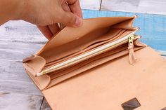 Product description * Material: vegetable tanned leather * Color: beige * Model features: 6 credit card slots, 2 pockets for bills, 1 zipper coin pocket; * Sewn by hand; * Size:10.5x20.0x3.5 cm * * * * * * * * * * * * * * * * * * * * * * * * * * * * * * * * * * * * * * * * * * * * * * * * * * * * * * * * * Please first look at the production process of our product. 1. The vegetable tanned leather is made in Italy: Vegetable tanning is an ancient production process for leather. Vegetable leather Beige Everyday Coin Purse, Beige Wallet With Coin Pocket For Daily Use, Beige Wallets With Interior Card Slots For Daily Use, Beige Wallet With Interior Card Slots For Daily Use, Classic Vegetable-tanned Wallets For Daily Use, Vegetable-tanned Bifold Wallet For Daily Use, Daily Use Vegetable-tanned Bifold Wallet, Daily Vegetable-tanned Bifold Wallet, Leather Inspiration