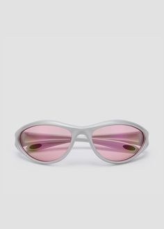 Lightweight, sleek and softly curved wraparound design for both sports and non-sport activities. Features anti-slip rubber nose pads and ear tipsSilver frames with pink lenses. Sunglasses Women Pink, Baddie Accessories, Ski Chic, Oakley Sunglasses Women, Y2k Glasses, Orange Mirror, Pink Lenses, Sport Activities, Y2k Sunglasses