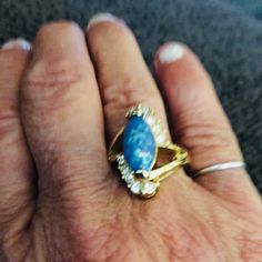 Beautiful Ring, Simulating A Fire Opal. Also Cubic Zirconia Stones. Gold Plate With Unknown Metals, Size 7.5 Please Let Me Know If You Have Any Questions Elegant Blue Opal Ring, Blue Opal Ring With Accent Stones, Fire Opal Ring, 5 Rings, Ring Color, Opal Ring, Beautiful Ring, A Fire, Opal Rings