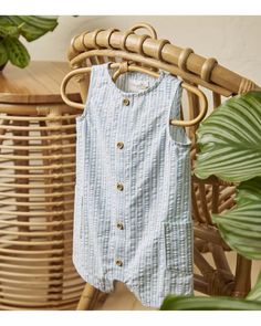 Blue Stripe Baby Seersucker Button-Front Romper Made with Organic Cotton | carters.com Summer Cotton Bubble Romper With Button Closure, Summer Cotton Jumpsuits And Rompers With Buttons, Spring Cotton Bubble Romper With Buttons, Cotton Bubble Romper With Buttons For Spring, Spring Cotton Bubble Romper With Button Closure, Spring Striped Cotton Jumpsuits And Rompers, Striped Cotton Jumpsuits And Rompers For Spring, Striped Cotton Jumpsuits And Rompers For Beach, Summer Striped Cotton Jumpsuits And Rompers