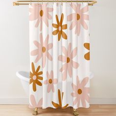 a shower curtain with pink and orange flowers on it, in front of a white bath tub