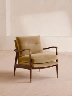 a chair sitting on top of a hard wood floor