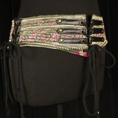 ♥  YULA  ♥  To view more gorgeous Corset Belts please follow this link  https://www.baroccotribal.com/corsetbelt COLOUR Iridescent LEAF GREEN, MAGENTA & TEAL shades with GREEN & MAGENTA detailing, and METALLIC ANTIQUE PALE GOLD embellishment. N.B. Products may vary in colours due to computer settings. On occasion the silk may have small signs of wear that show the beauty of its age. We photograph anything we notice.  APPROXIMATE MEASUREMENTS AND SIZE: Lacings make these Corset Belts adjustable. Teal Shades, Corset Belts, Cinch Belt, Hip Scarves, Corset Belt, Gold Embellishment, Pirate Costume, Leaf Green, Belt Black