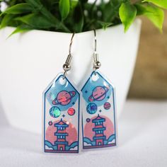 Blast off into your own kawaii universe with these adorable earrings! Bring all the ethereal vibes with you wherever you wander <3 ~ Handmade by yours truly, these little cuties feature a glitter resin inlay and will bring a shine into any room!  Made with all the love! Magical Nickel-free Earrings For Gifts, Space-themed Drop Earrings As Gift, Nickel-free Magical Earrings For Gift, Handmade Space-themed Earrings For Gift, Handmade Space-themed Earrings As Gift, Kawaii Hypoallergenic Earrings As Gift, Kawaii Hypoallergenic Earrings For Gift, Hypoallergenic Kawaii Earrings As Gift, Hypoallergenic Kawaii Earrings For Gifts