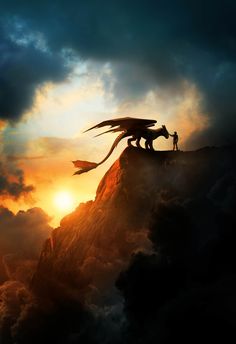 a dragon on top of a mountain with the sun setting in the sky behind it