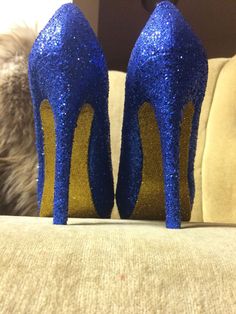 Royal blue covers the entire top portion of the heels while the underside is covered in ultra-fine yellow gold glitter. These heels can be made in any color combo desired. If you would like another color combination please leave your color choices at checkout. This heel is available in additional colors and shoe styles. If you would like these heels in an open toe heel please feel free to leave a message indicating the change in the buyer's notes at checkout. We are able to change the color, for Blue Glitter Heels For Evening, Blue Glitter Evening Heels, Blue Glitter Heels With Round Toe, Royal Blue Open Toe Heels For Party, Blue Glitter High Heels, Heels Closed Toe, Tall Heels, Heels Short, Blue High Heels